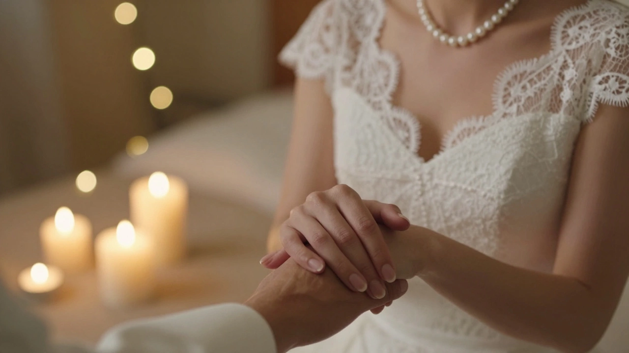 Close-up of a couple holding hands, highlighting a vintage lace dress and pearl necklace.